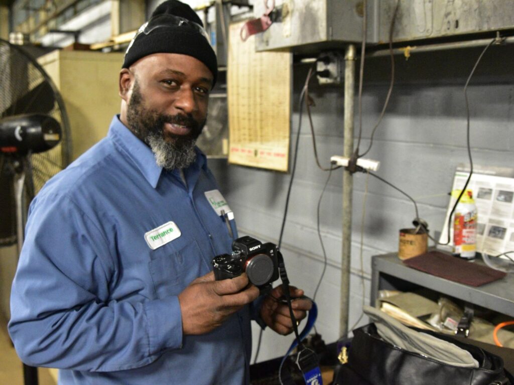 Terrance Jones holds his new camera.